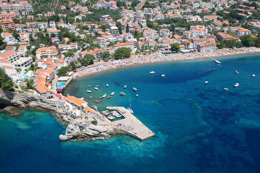 Bird's eye view of Petrovac: a picturesque bay with a beach